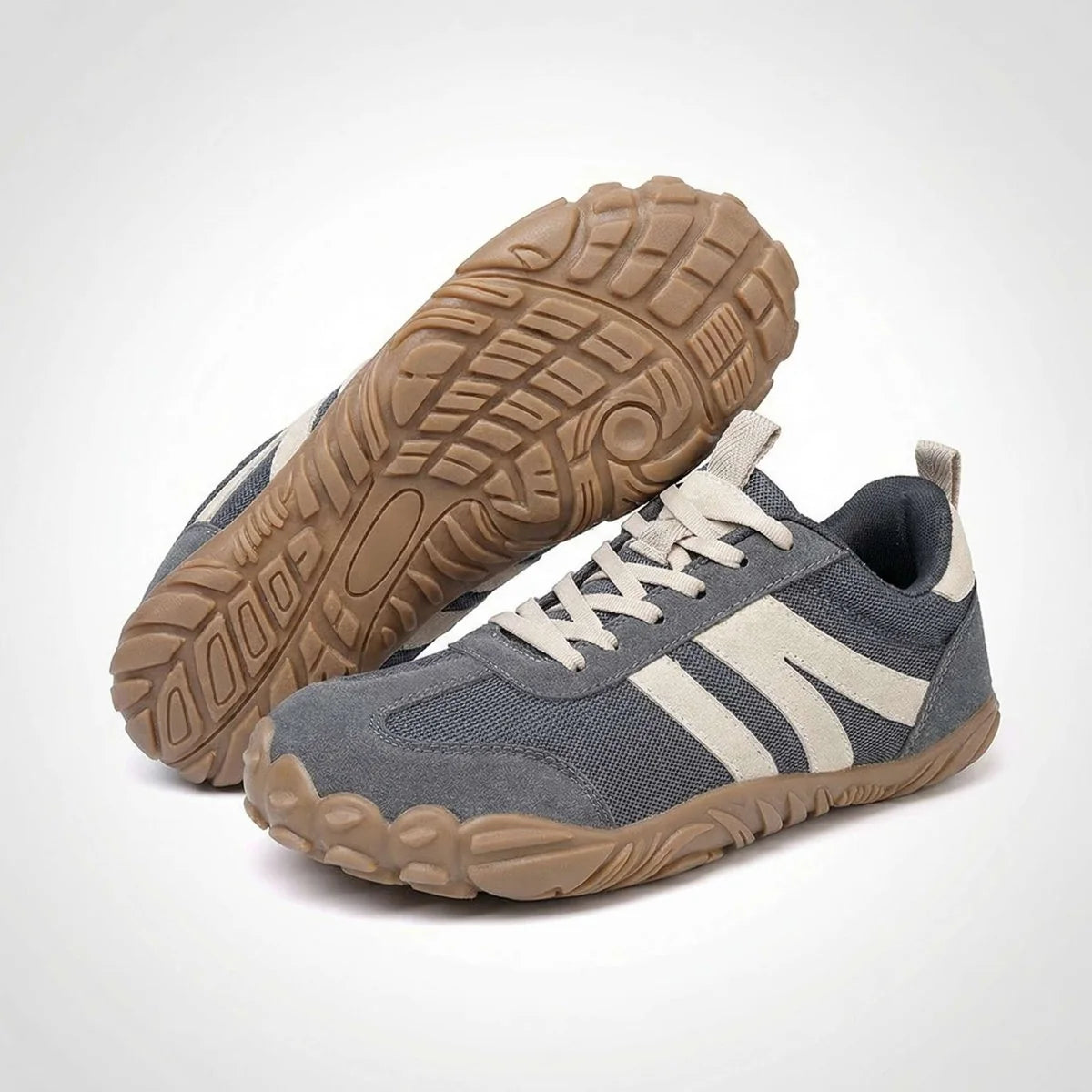 Grey walking trainers with outsole detail