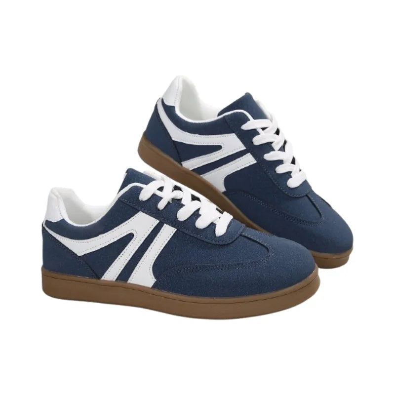 Blue wide fit trainers for women, pair on white background