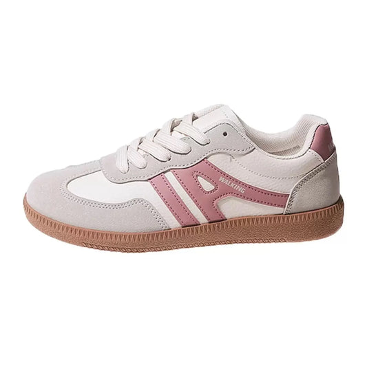 Women's pink and white wide fit trainers, side profile on a white background