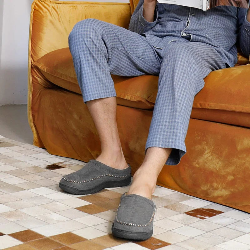 Men's house slippers shown on foot
