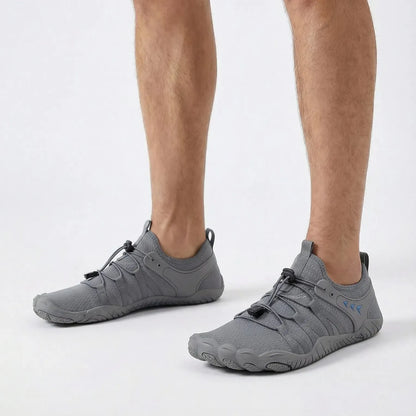 Grey wide toe box shoes worn with shorts, front and side view