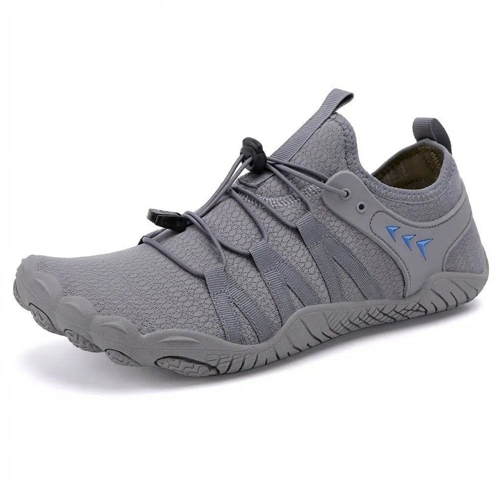 Grey barefoot walking shoes with quick-lace toggle, studio view