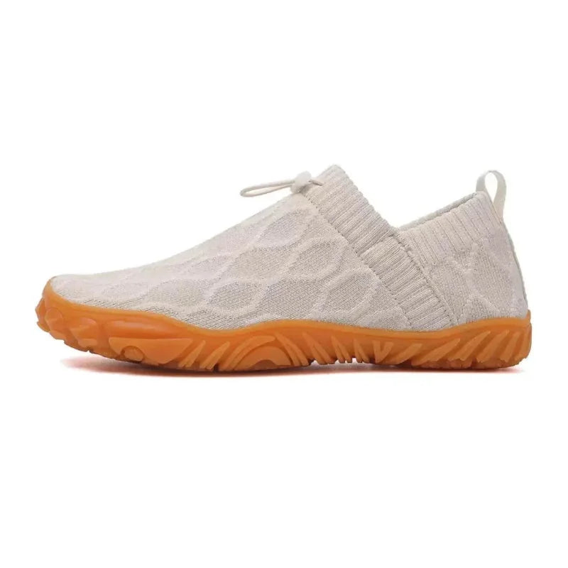 White barefoot walking shoes, isolated side studio view