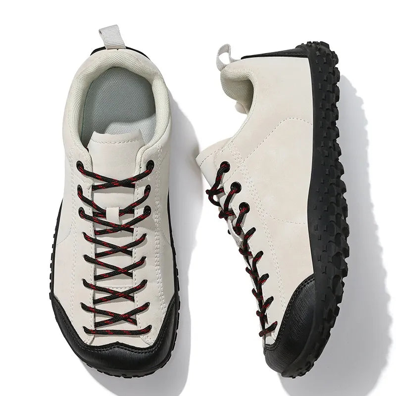 Pair of white wide toe walking trainers shown from above and the side