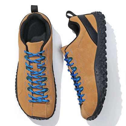 Pair of tan wide toe walking trainers with blue laces, top and side views