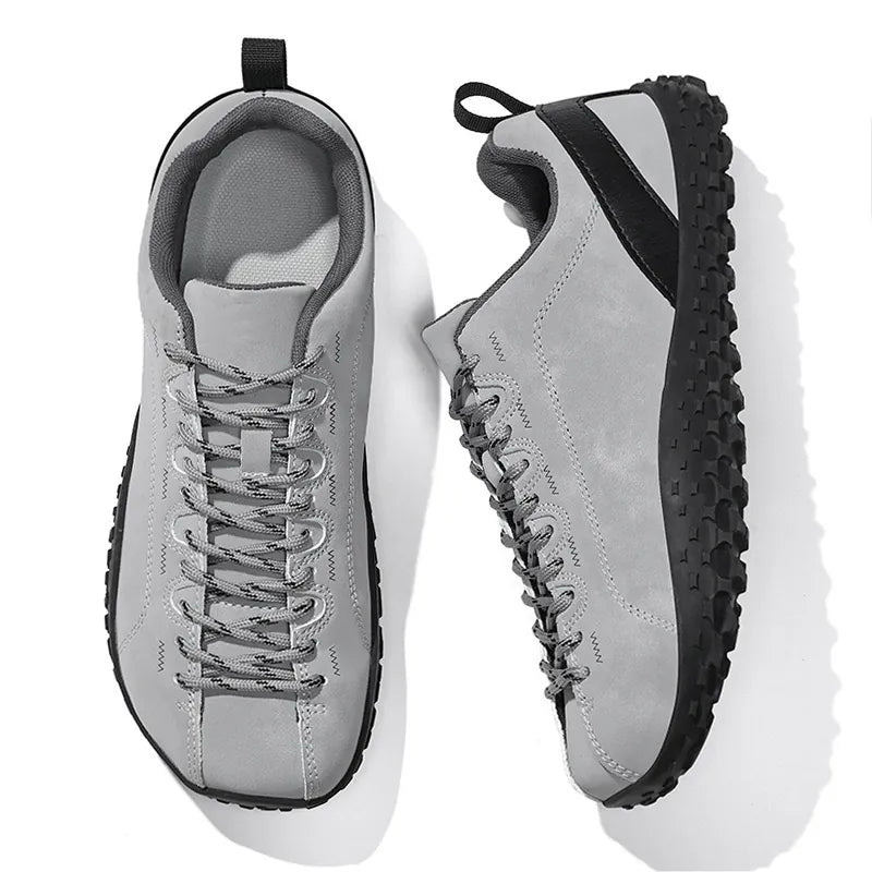 Pair of grey wide toe walking trainers shown from above and the side