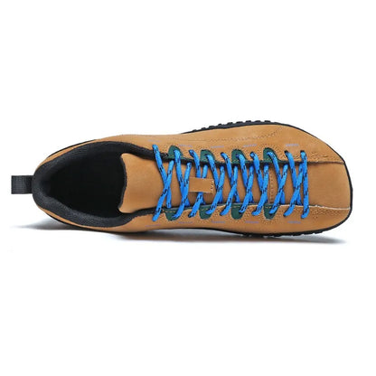 Tan wide toe walking trainer with blue laces viewed from above