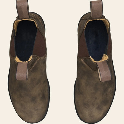 Brown Chelsea boots shown from above with elastic side panels