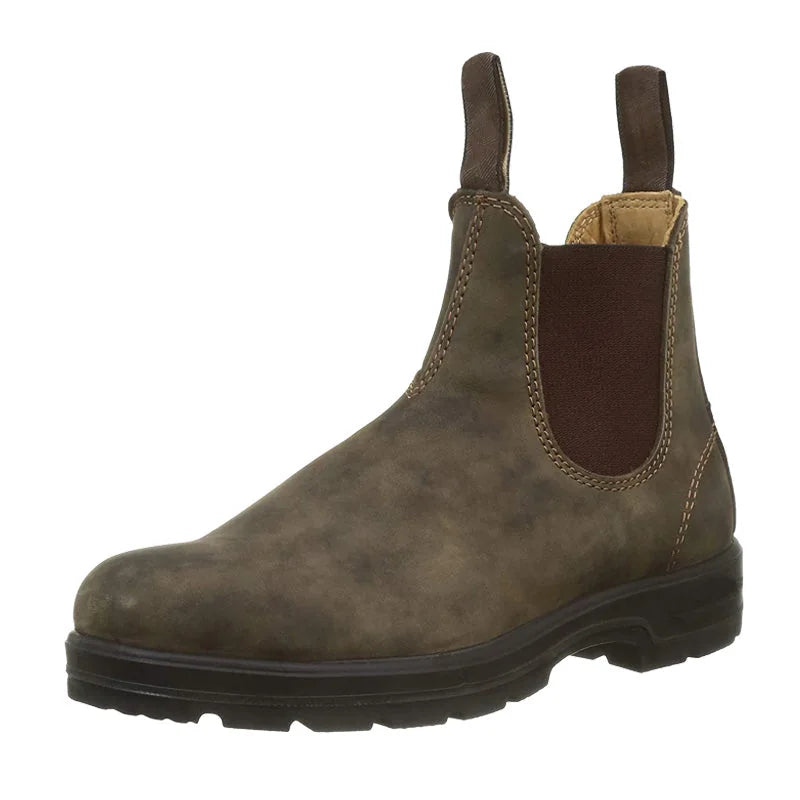 Brown Chelsea boot with elastic side panel, isolated studio view