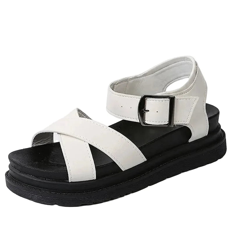 Women's white walking sandals with cross straps and an ankle buckle, side profile