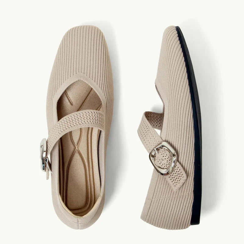 Pair of beige square toe Mary Jane flats shown from above and the side