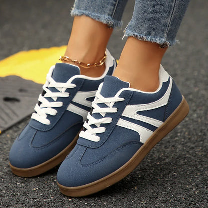 Blue wide fit trainers for women, close on-foot view