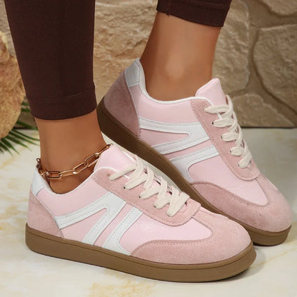 Pink retro trainers for women, side on-foot studio view