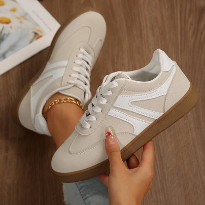 White wide fit trainers for women, top-down on-foot view