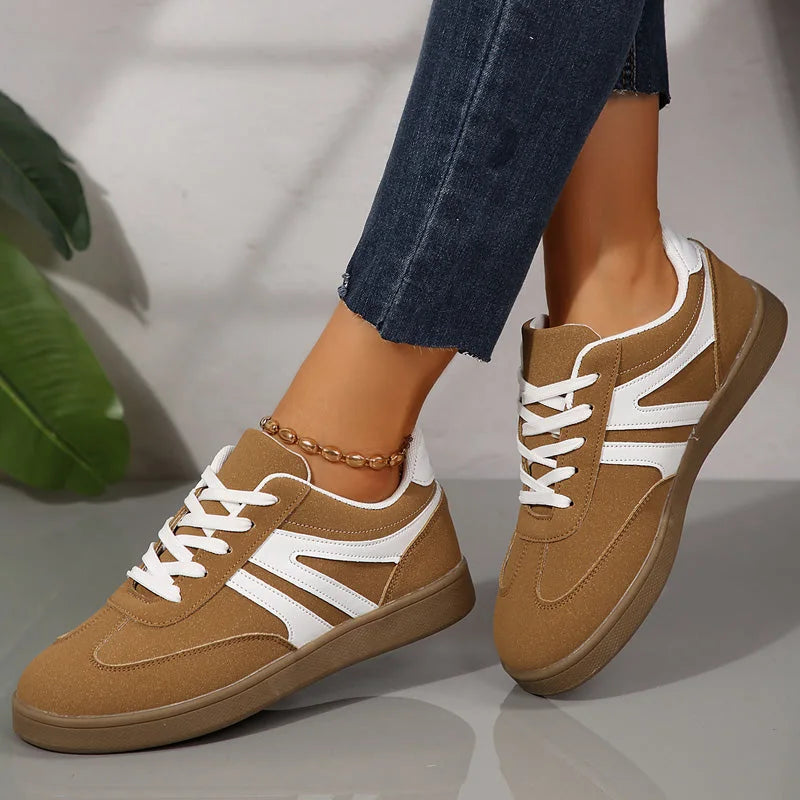 Brown walking trainers for women, close on-foot view