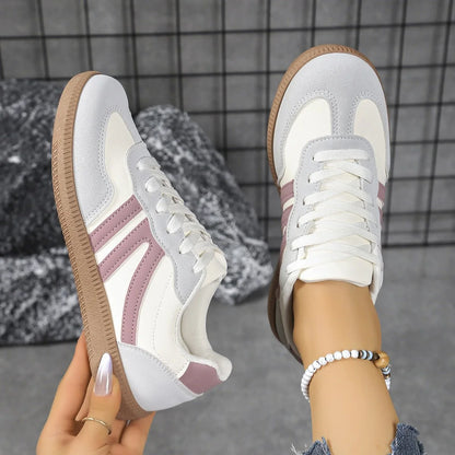 Women's walking trainers shown on foot