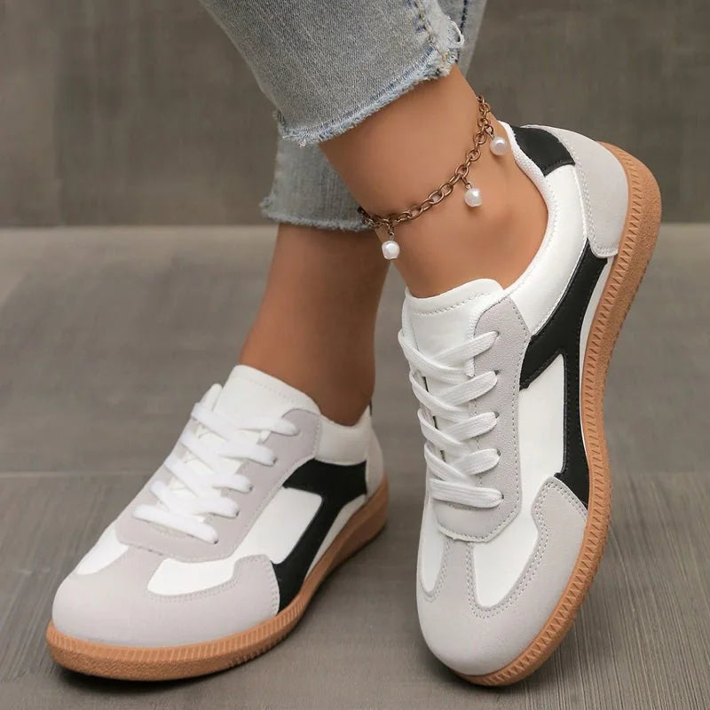 Women's walking trainers shown on foot