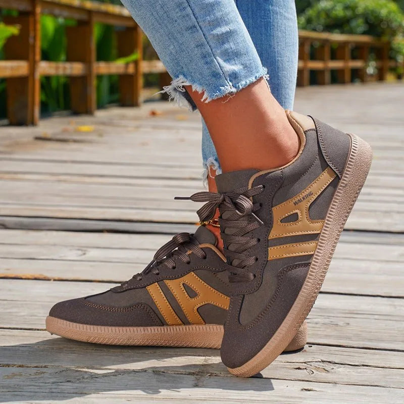 Women's walking trainers shown on foot