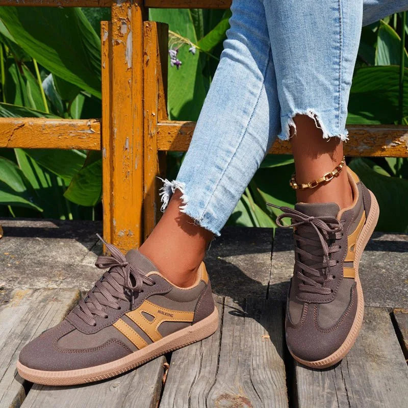 Women's walking trainers shown on foot