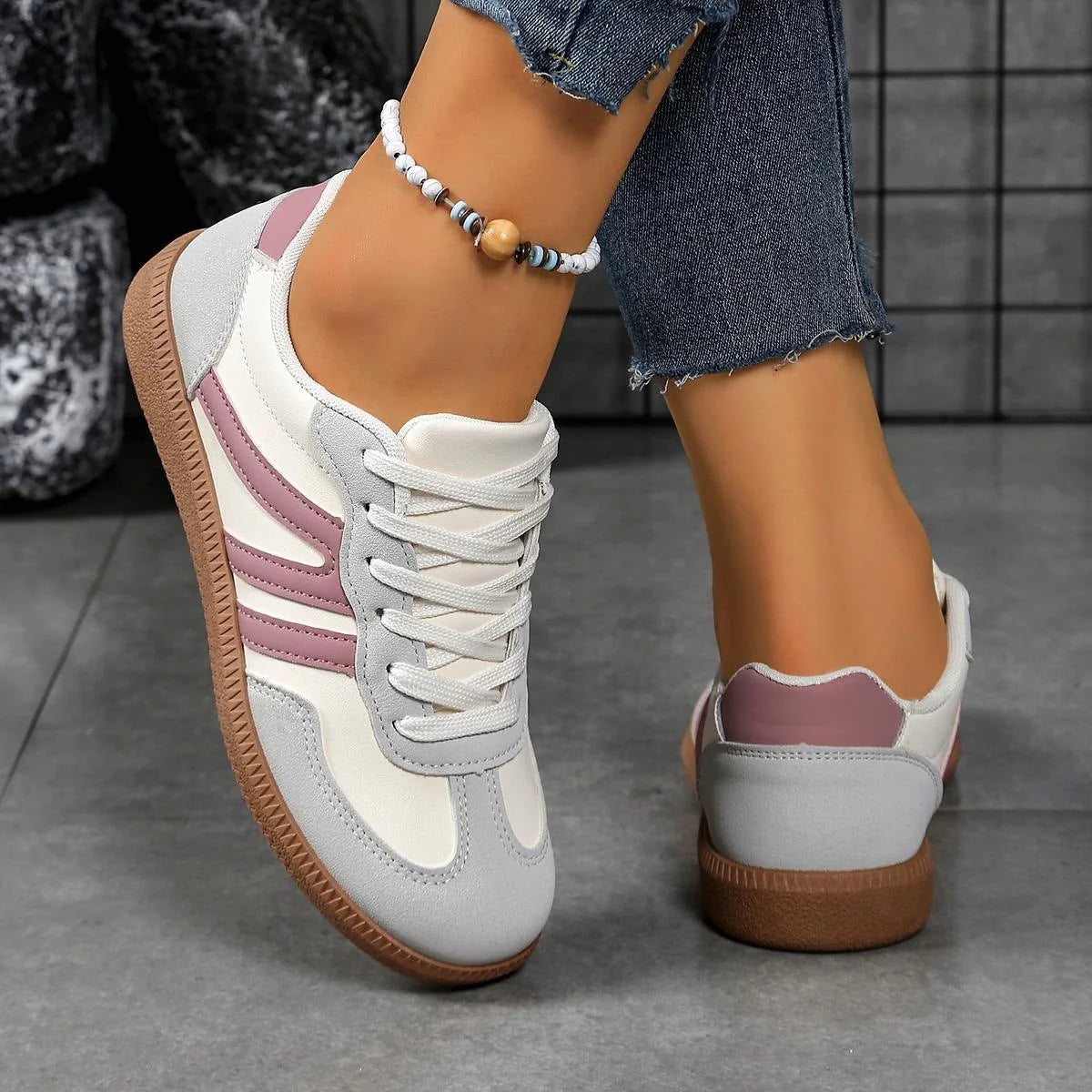 Women's walking trainers shown on foot