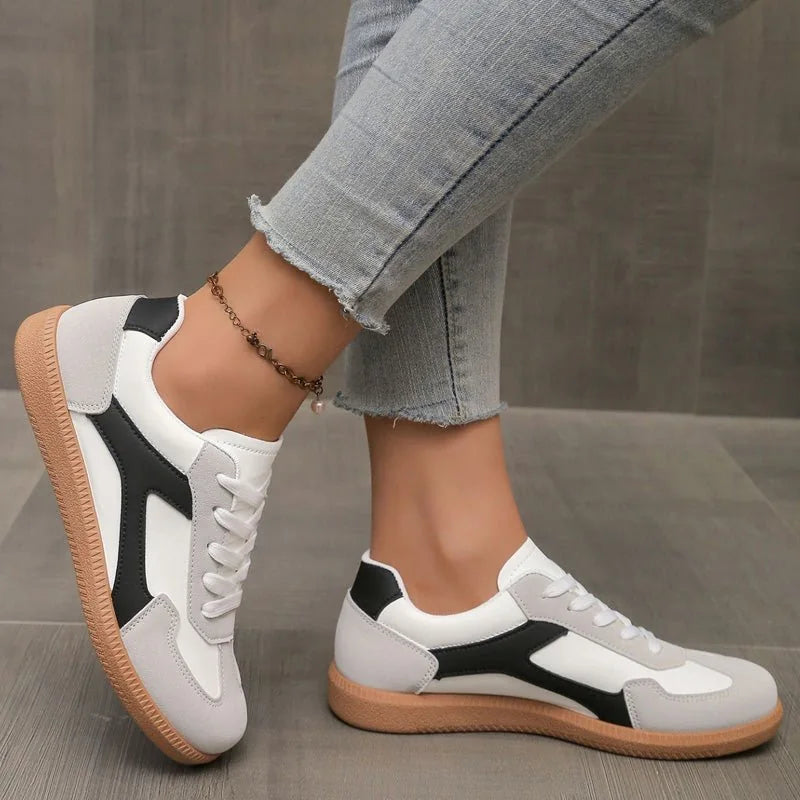 Women's walking trainers shown on foot