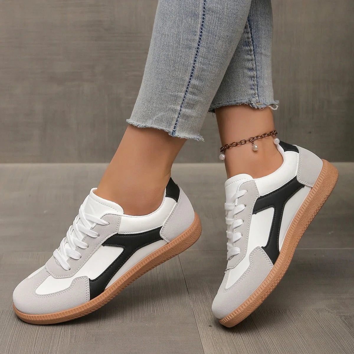 Women's walking trainers shown on foot