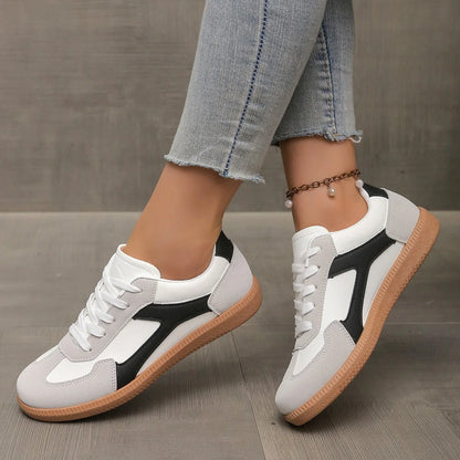 Women's walking trainers shown on foot