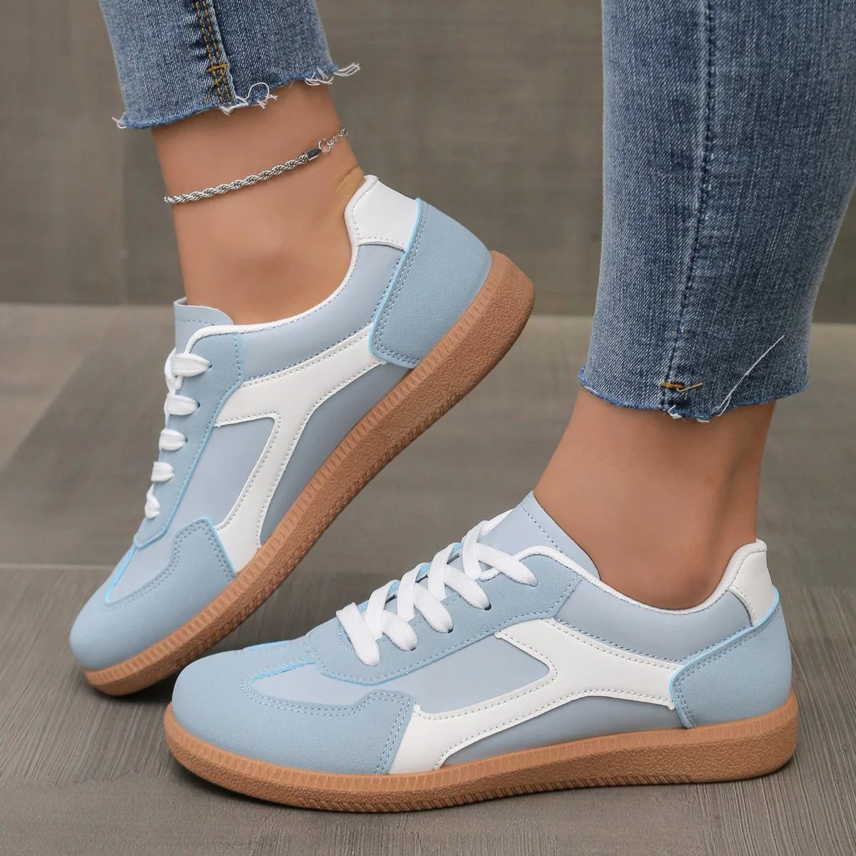 Women's walking trainers shown on foot