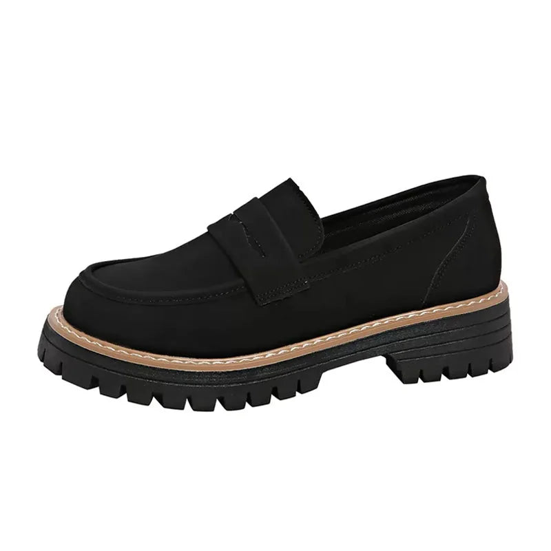 Women's wide fit loafers in black, isolated side view