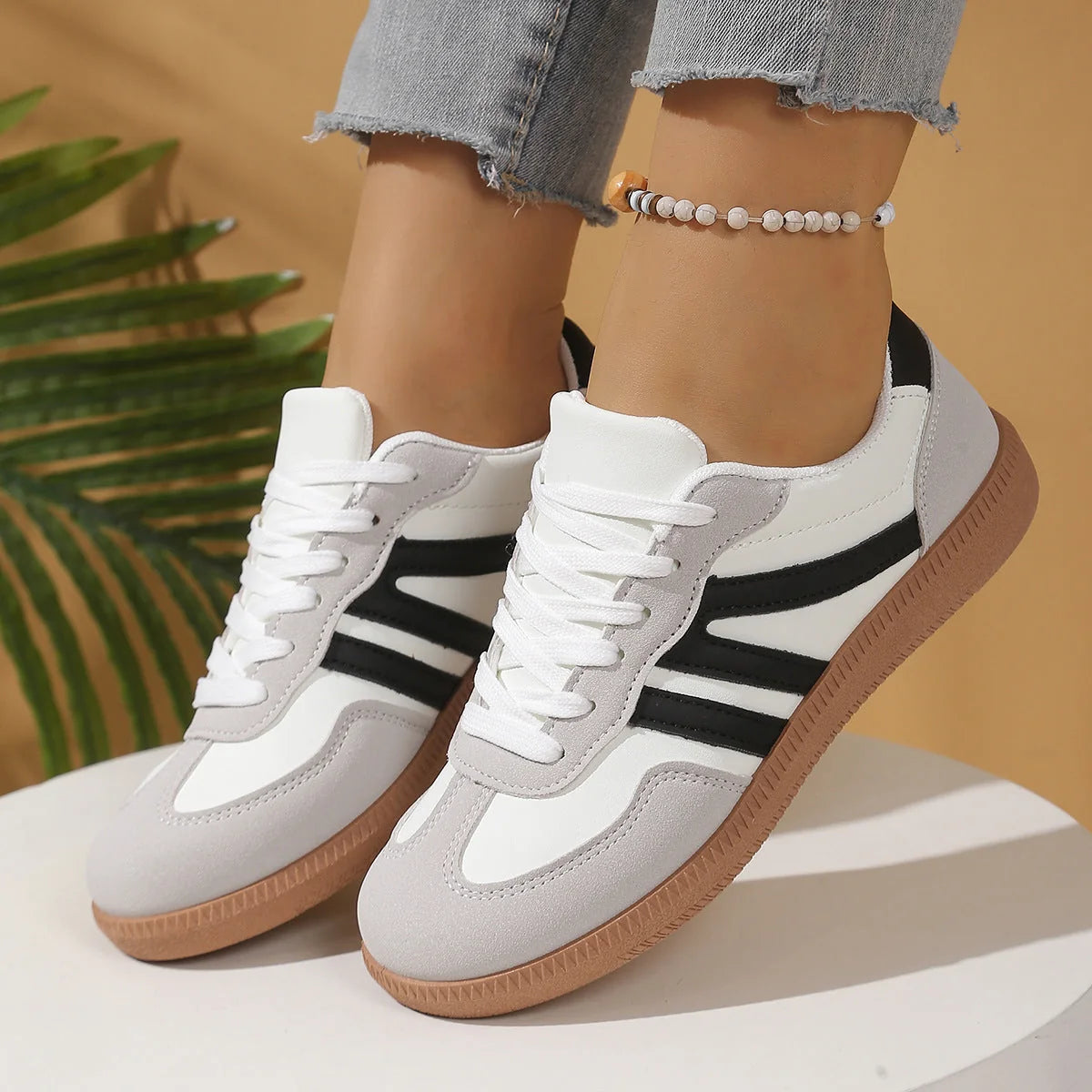 Women's walking trainers shown on foot