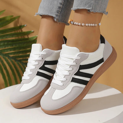 Women's walking trainers shown on foot