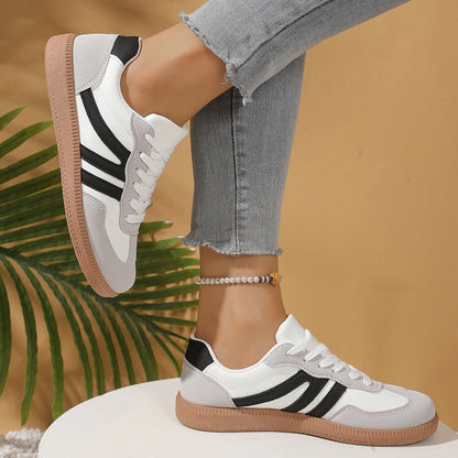 Women's walking trainers shown on foot