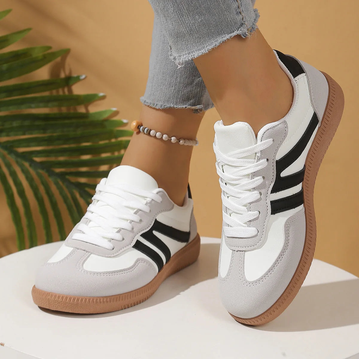 Women's walking trainers shown on foot