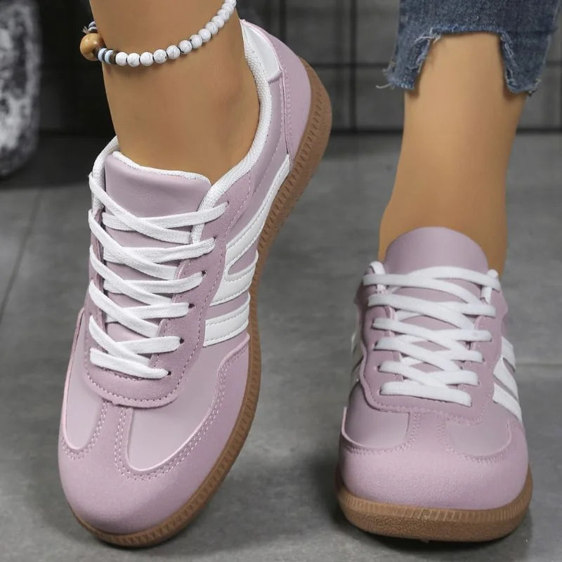 Women's walking trainers shown on foot