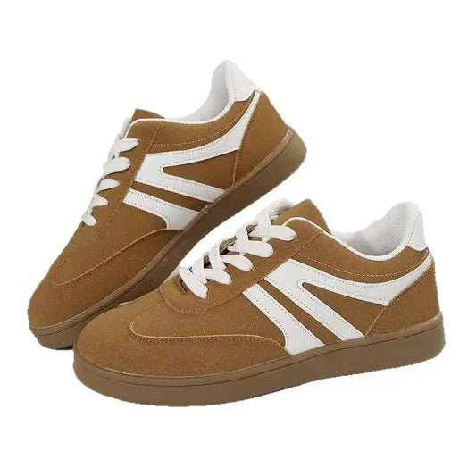 Brown wide fit trainers for women, pair on white background