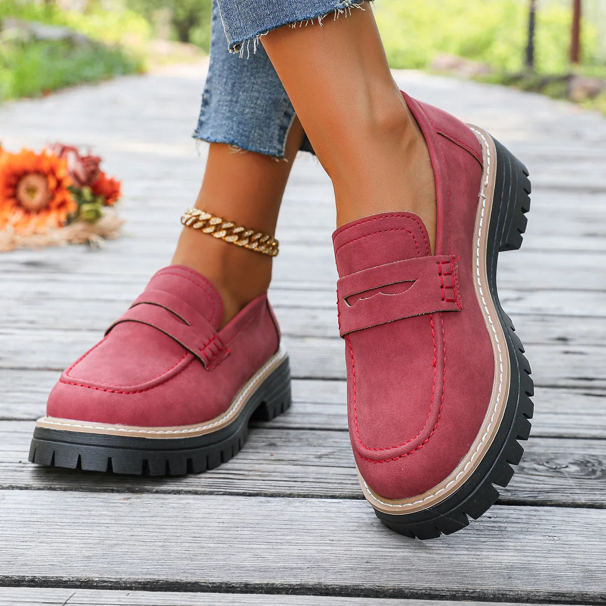Red platform loafers for women, on-foot side view