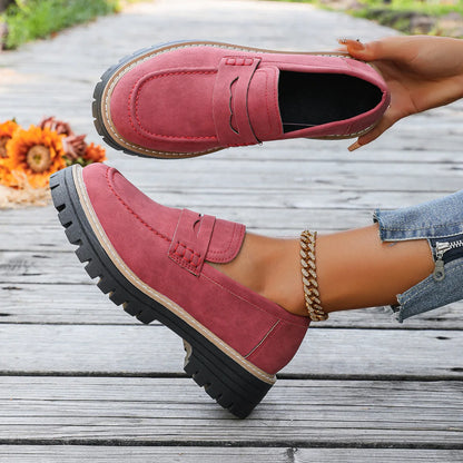 Red chunky sole loafers shown from the top and side