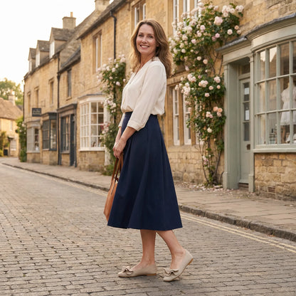 Women's knit slip-on flats worn in a lifestyle setting