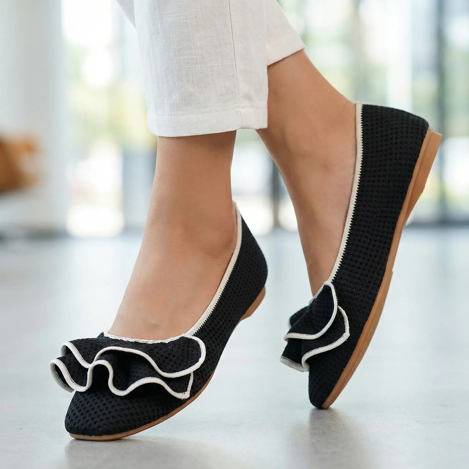 Women's knit slip-on flats shown on foot