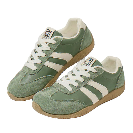 Women's wide fit trainers in olive green, pair on white background