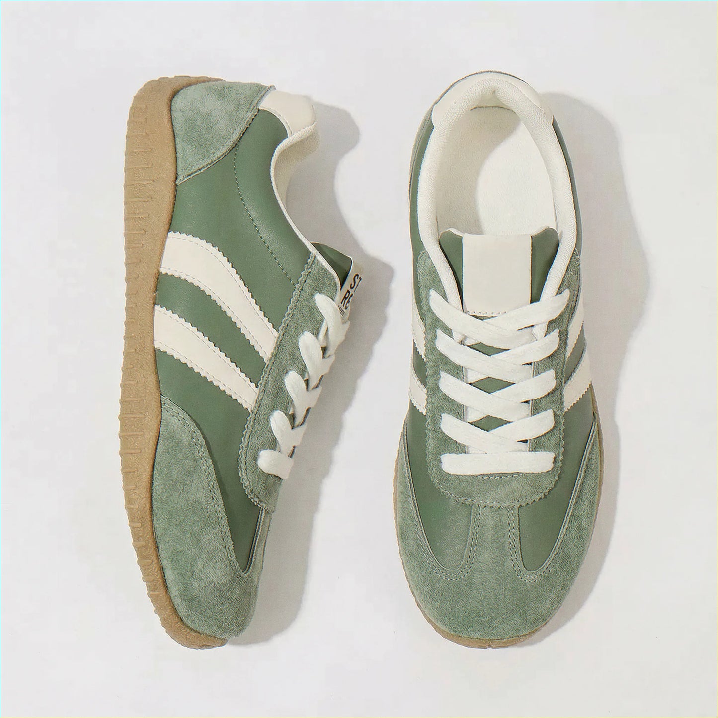 Olive green retro trainers for women, top-down pair view