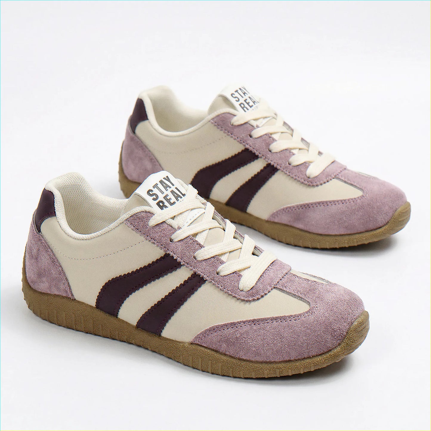 Lavender wide fit trainers for women, side and angled studio views