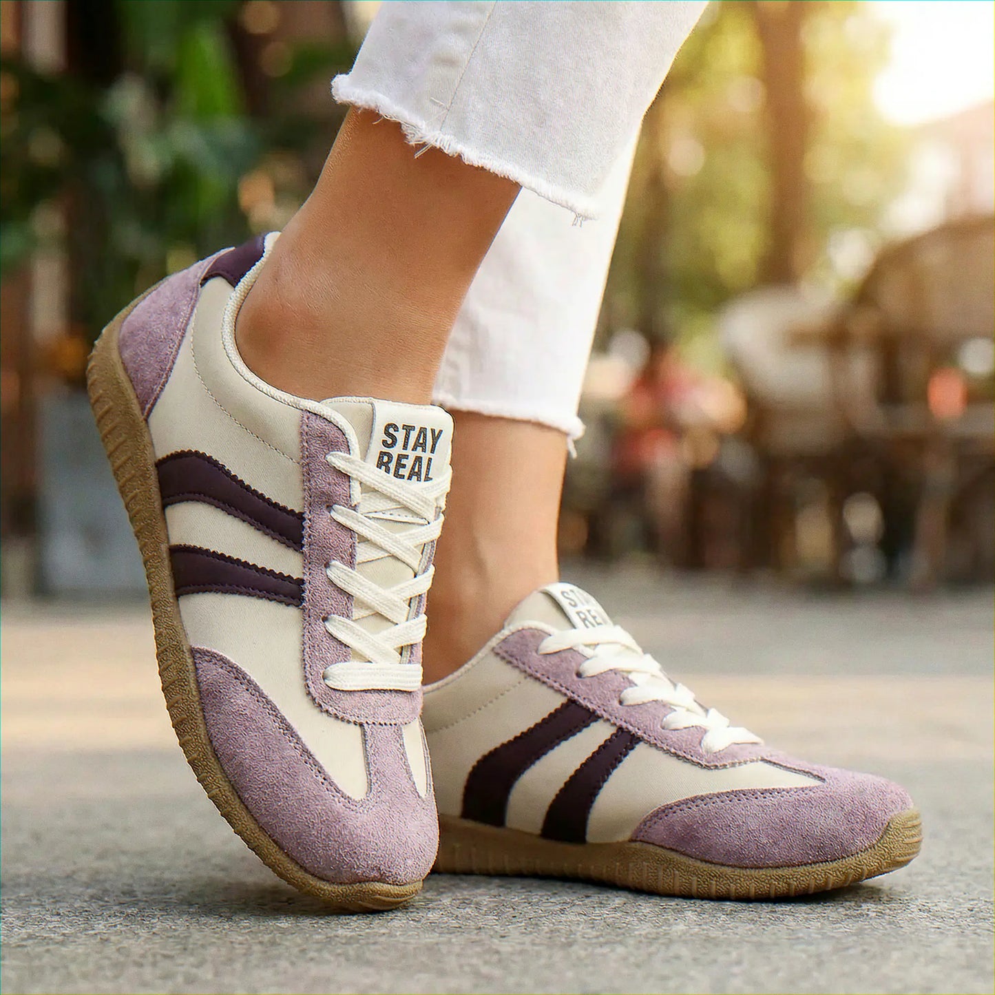 Lavender wide fit trainers, close on-foot park view