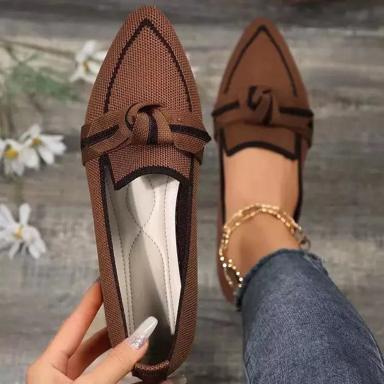Women's ballet flats shown on foot