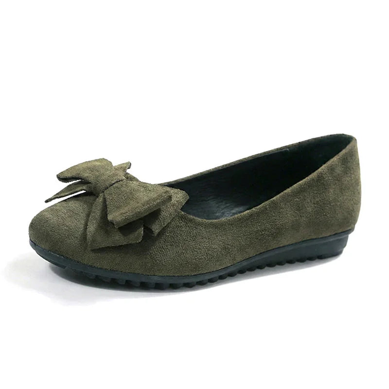 Women's olive wide fit ballet flats with a bow, side profile on white