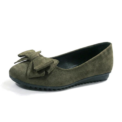 Women's olive wide fit ballet flats with a bow, side profile on white