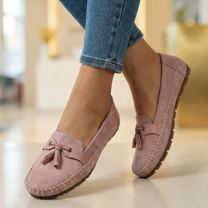 Blush pink loafers for women, close on-foot indoor view